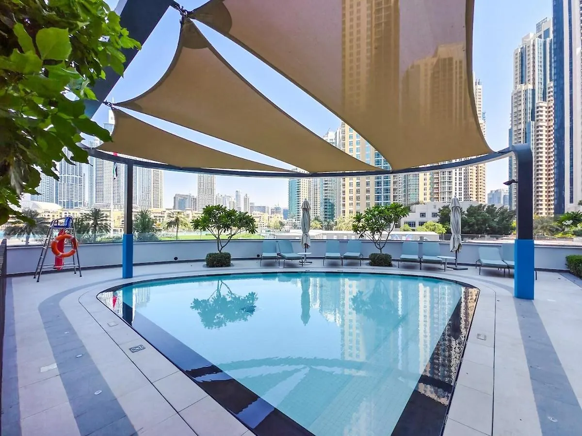 Newly Furnished 1Br - Grande Signature Residence Дубай